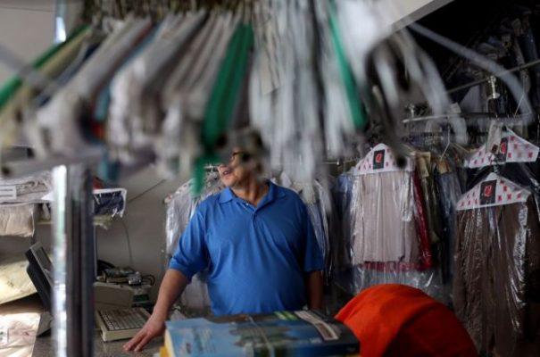 Kim Jong Un's uncle, the husband of Kim's maternal aunt, is seen April 24 at work at the dry-cleaning that he and his wife operate. They have been living in the United States since 1998. MUST CREDIT: photo for The Washington Post by Yana Paskova.