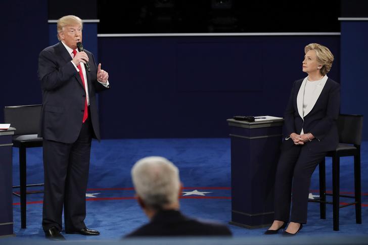 Republican U.S. presidential nominee Donald Trump speaks at the start of the second U.S. presidential town hall debate between Trump and Democratic U.S. presidential nominee Hillary Clinton at Washington University in St. Louis, Missouri, U.S., October 9, 2016. REUTERS/Jim Young