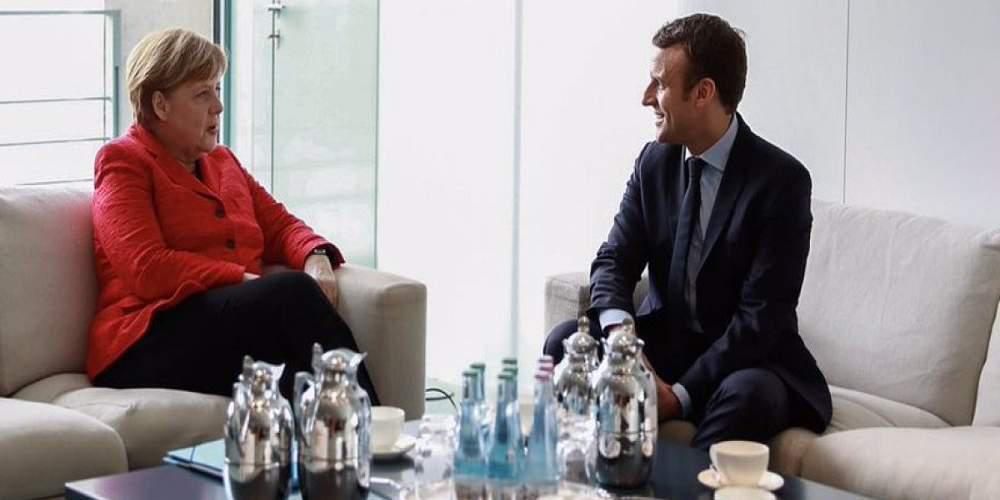 Μήνυμα στενής συνεργασίας στέλνουν Μέρκελ-Μακρόν